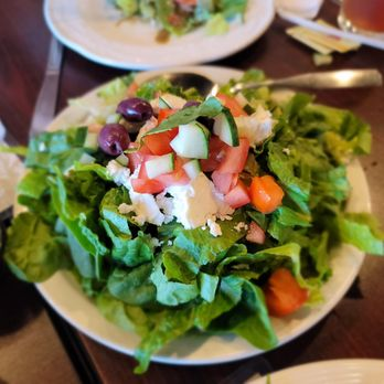 Los Olivos house salad with greens, tomato, olives and feta